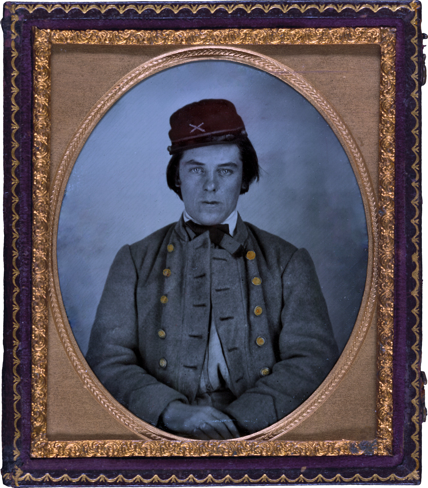 Unidentified artillery soldier in Confederate uniform and kepi hat.