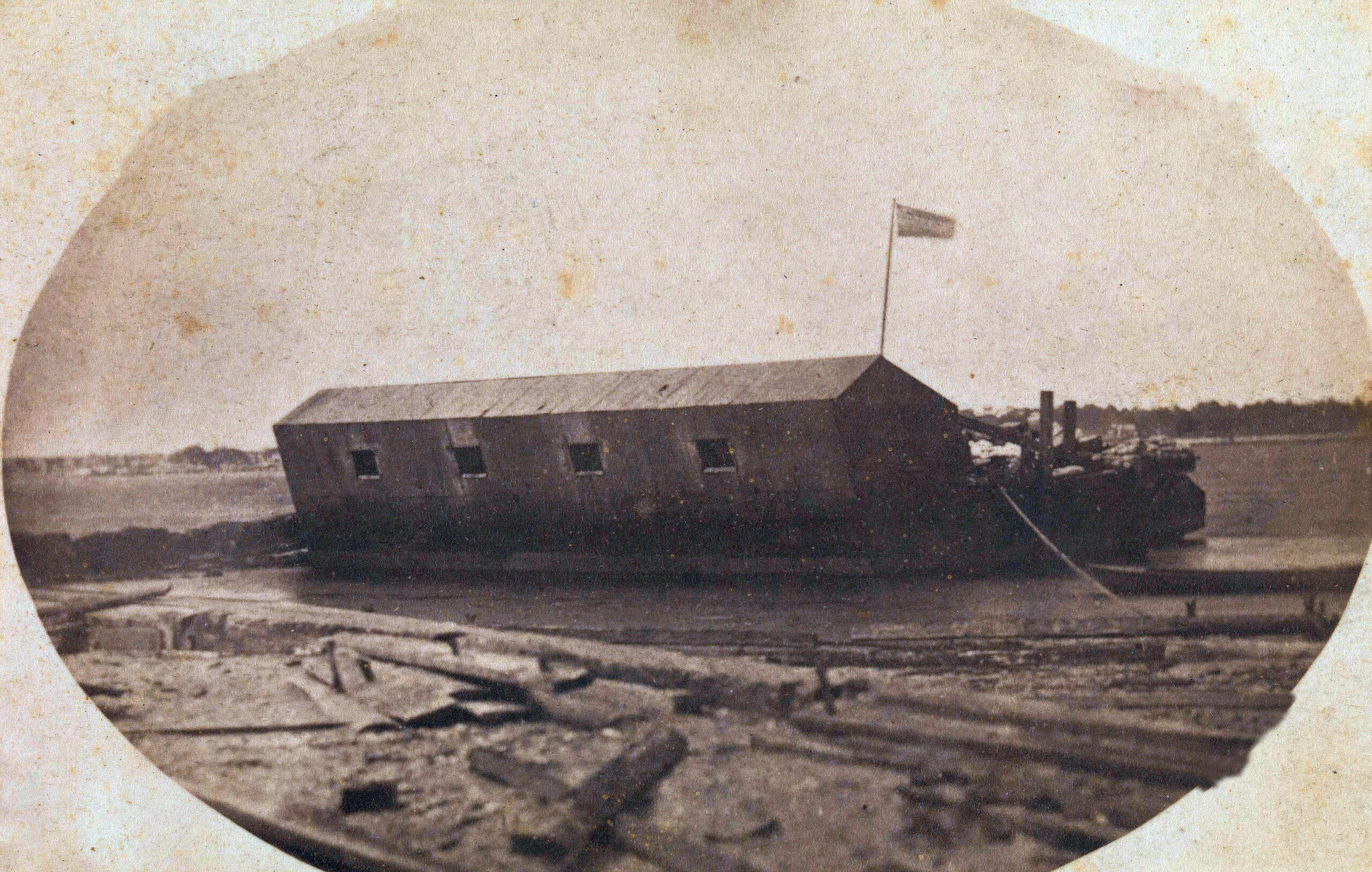 The Floating Battery was moored near Fort Moultrie on Sullivan’s Island, as shown in this photo taken the evening before the Confederates opened fire on Sumter. 