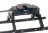 fifth wheel hitch mounted in the bed of the pickup truck