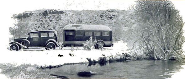 A "home on wheels" on a Nevada road in winter. Built-in heating and air-conditioning provide comfort under all climatic conditions.