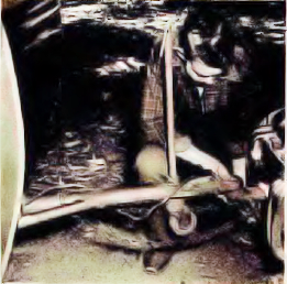 Standard hitch connects teardrop trailer and car.  Threaded caster levels teardrop body floor when parked.